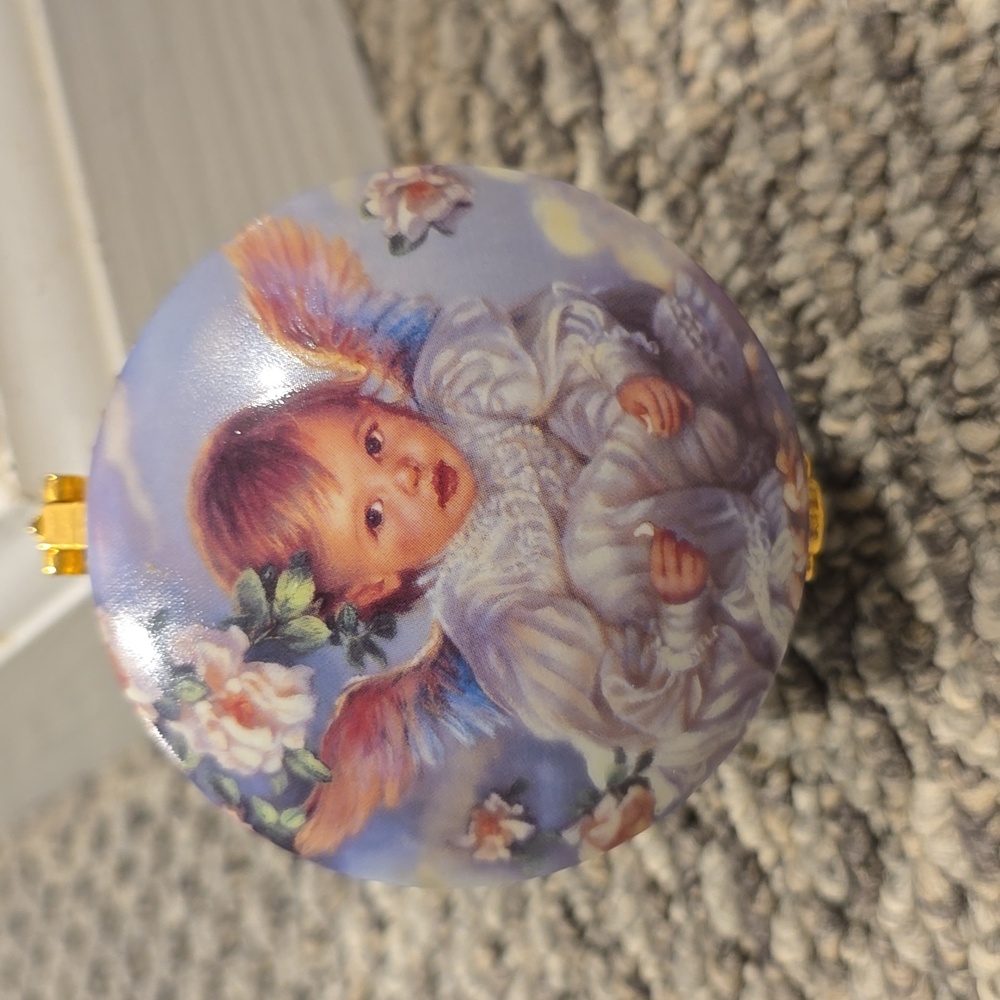 Monday's Child Porcelain Music Box
